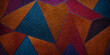 © StockFabi - Geometrisches Muster mit strukturierten, dreieckigen Elementen in kräftigen Farben, das durch die harmonische Anordnung von Formen und Farben eine beeindruckende visuelle Tiefe schafft