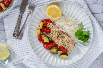 Canvas Print - Oven baked salmon and vegetables with rice