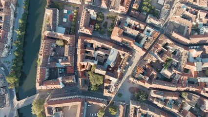 Wall Mural - Strasbourg, France. Panoramic view. Roofs of houses. Summer morning, Aerial View, HEAD OVER SHOT