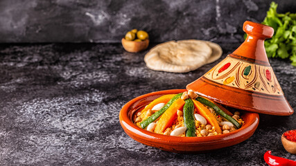 Wall Mural - Vegetable tagine with almond and chickpea couscous.