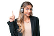 © luismolinero - Telemarketer pretty Uruguayan woman working with a headset over isolated background pointing with the index finger a great idea