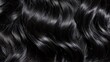 © Zainab - Close up view of natural shiny dark hair, bunch of black brunette curls background