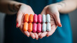 © Summiyya - Hand holding  antibiotic capsule pills