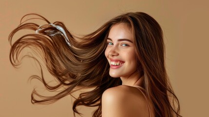 Wall Mural - A woman with long brown hair is smiling and posing for a picture