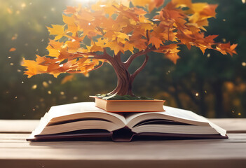 Wall Mural - A small tree with autumn leaves growing from an open book, symbolizing knowledge and growth. The scene is set outdoors with sunlight filtering through the leaves. Read a Book Day.