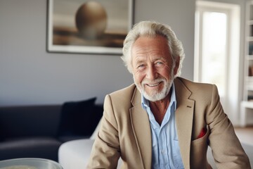 Wall Mural - Portrait of a cheerful man in his 80s dressed in a stylish blazer isolated in crisp minimalistic living room