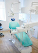© peopleimages.com - Empty, dentist and office for medical wellness, furniture for oral healthcare with machine. Workplace, dental and consulting room with tools for teeth, professional cleaning or service for mouth