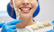 © Lumeez23/peopleimages.com - Dentist, cleaning and dental procedure for toothache in clinic, health and treatment for mouth. Teeth whitening, smile and person with torque wrench machine, orthodontics and oral care for veneers