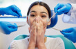 © peopleimages.com - Woman, dental patient and scared or shock for healthcare, portrait and medical surgery. Female person, overwhelmed or dentist hand with tools, frightened anxiety for toothache or fear in chair