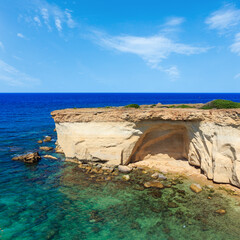 Canvas Print - Grottoes on Spiaggia Massolivieri beach. Summer sea landscape (Siracusa, Sicily, Italy)