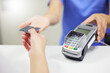 © Lumeez23/peopleimages.com - Medical, people and credit card in hospital with nurse, healthcare and insurance payment with fintech. Clinic, help and patient service with pos machine, budget and finance for doctor consultation