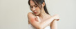 © Pormezz - Dermatology, asian young woman reaction from atopic, insect bites on her arm, hand in scratching itchy red spot or rash of skin. Healthcare, treatment of beauty.