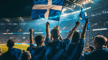 Wall Mural - Scotland football soccer fans in a stadium supporting the national team wearing blue shirt, supporting , cheering and rising Scotland national flag in european football league