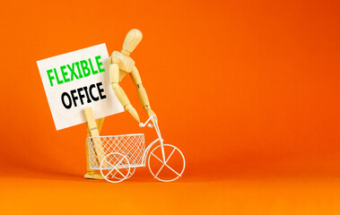 Flexible office symbol. Concept words Flexible office on beautiful white paper on wooden clothespin. Beautiful orange background. Bike model. Business Flexible office concept. Copy space.