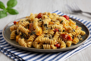 Homemade Baked Boursin Pasta on a Plate, side view.