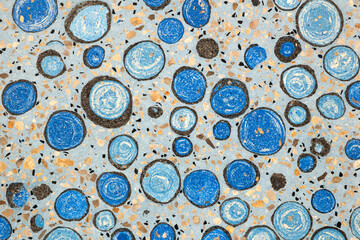 Poster - A blue and white pattern of circles is on a surface. The circles are of different sizes and are scattered throughout the image. Scene is calm and serene, as the circles seem to be floating in the air