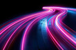 © shobakhul - A long, curving road with bright pink and blue lights