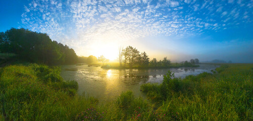 Wall Mural - sunrise over the lake