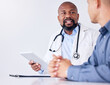 © peopleimages.com - Doctor, patient and discussion with man or tablet, results consultation and medical advice for treatment. Diagnosis, professional and healthcare communication, clinic check up and people talking
