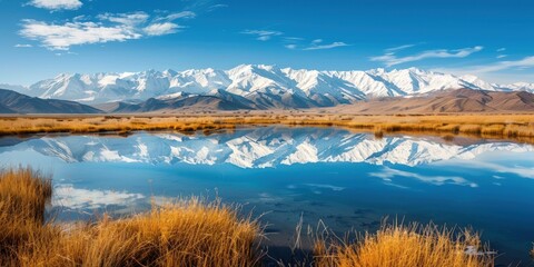 Wall Mural - A large body of water with mountains in the background