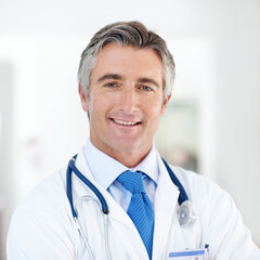 Poster - Portrait, doctor and man in clinic, smile and stethoscope with wellness, expert in hospital and pride. Face, happy person or medical with professional, trust and employee with cardiology or service