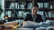 © basketman23 - Businesswoman at her desk with paperwork
