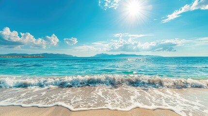 Wall Mural - Clear blue waters of a summer sea beach with sunshine and bright sky for summer vacation inspiration