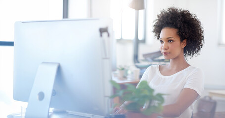 Poster - black woman, typing and reading with computer at office desk for administration or data capturing. y