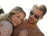 © DL/peopleimages.com - Couple, beach and portrait on vacation with hug for love in relationship with travel abroad. People, holiday and embrace on getaway trip, summer and sun with support and affection outdoor on date