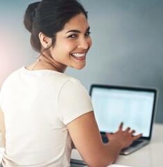 Poster - Happy woman, portrait and journalist with laptop for story, book or business news at office desk. Young female person, freelancer or writer with smile for report, typing or online novel on computer