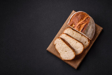 A loaf of brown bread with grains of cereals