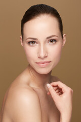 Sticker - Skincare, beauty or portrait of natural model in studio isolated on brown background for pride or wellness. Smooth face, body cosmetics or confident woman or healthy female person with shine or glow