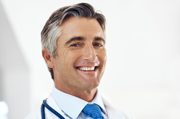 Poster - Portrait, doctor and man in clinic, cheerful or stethoscope with wellness, career ambition or trust. Face, mature or medical with professional, pride or employee with cardiology or expert in hospital