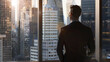 © VK Studio - A solitary figure stands by a window, silhouetted against a panoramic cityscape bathed in sunrise, contemplating the day ahead.