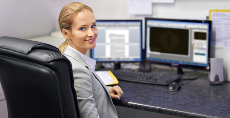 Wall Mural - Portrait, woman and smile at desk for printing, manufacturing or logistics in company. Female administrator, computer and data capture in office for information, technology or software for production