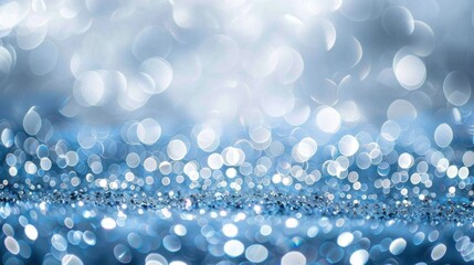 Poster - The image is a blue background with many small, round, white dots scattered throughout. The dots are of varying sizes and are arranged in a way that creates a sense of movement and energy