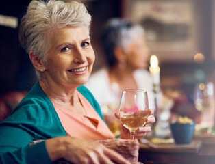 Sticker - Senior woman, smile and portrait with wine in restaurant for fun, vacation and dinner by friends. Elderly person, happiness and relax in diner for drinks, holiday and social celebration with memory