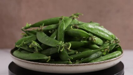 Wall Mural -  green peas pods on plate food