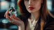 © steph photographies - Wealthy woman holding a diamond
