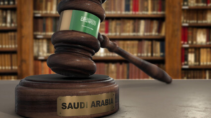 Wall Mural - Saudi Arabia Flag on Judge Gavel or Hammer in Court with Country Name. Legal System 3D Illustration