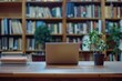 © Mamstock - Library desk with books and laptop representing education technology and e learning