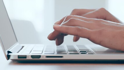 Poster - Freelance concept. Young female hands typing on laptop keyboard, working remotely from home, close up