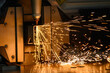 © Pixel_B - Close up scene the fiber laser cutting machine cut the square shape stainless steel tube with sparkling light.