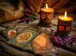 © Imagine - tarot cards lit by candles on a mystical background, mystical lights.