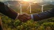 © Seksan - Two businessmen finalizing a deal on geothermal energy installations with a handshake, promoting environmental cooperation and sustainable energy