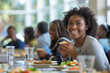 © wolfhound911 - African American students enjoying lunch in the cafeteria