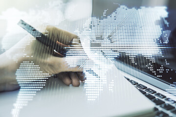 Poster - Double exposure of abstract digital world map and hand writing in notebook on background with laptop, research and strategy concept