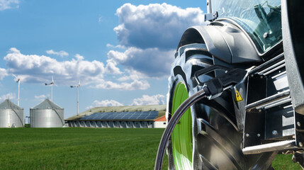 Electric agricultural tractor with connected charging cable. Concept