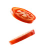 © Char_mon - Two fresh slices of tomato falling against a white background, Cut-out