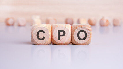 Wall Mural - the word CPO is written on wooden cubes